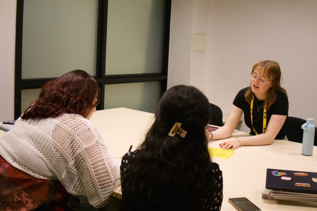 NSEMM tutor conducting a one-on-one tutoring session with a student